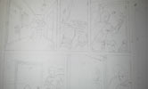 Closeup of finished comic page pencils